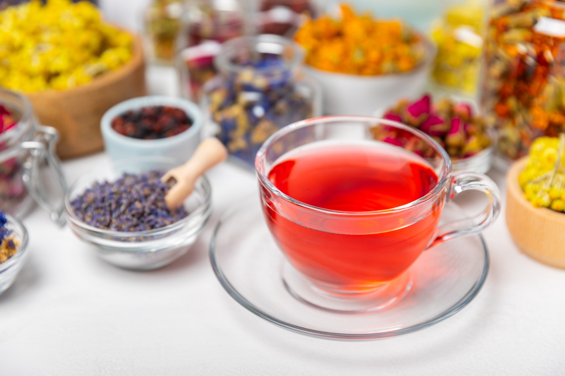 Assortment of dry herbal and berry tea on background.Medicinal Healing herbs.Alternative medicine concept.Linden, calendula, cornflowers, marigold, tansy, tea rose.dry herbal